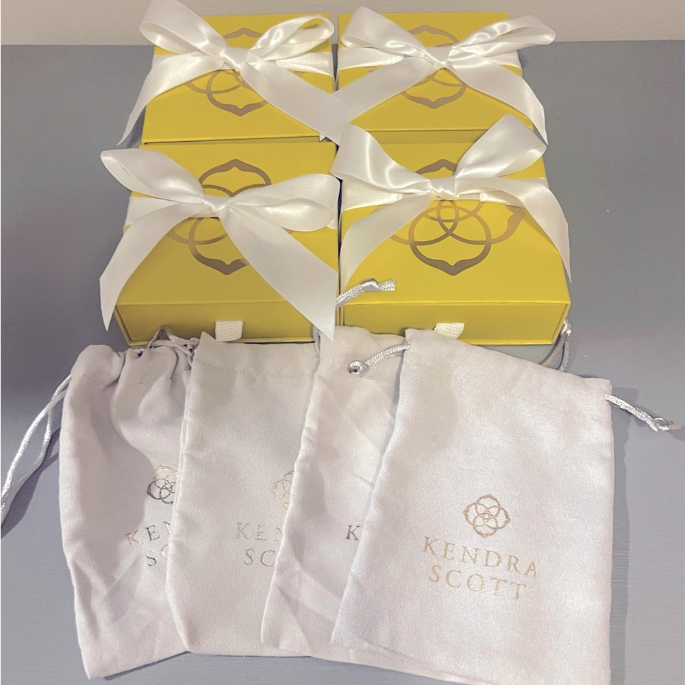 4 Brand New Kendra Scott boxes with ribbons and bags